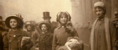 Constance awaiting sentencing on the far right of the photo in 1912 .