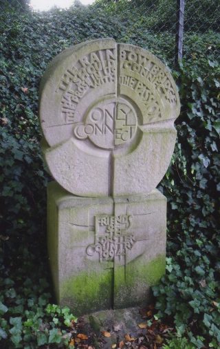 A colour photograph of the statue to E M Forster in St Nicholas' churchyard in Stevenage