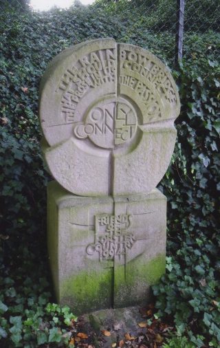 A colour photograph of the statue to E M Forster in St Nicholas' churchyard in Stevenage